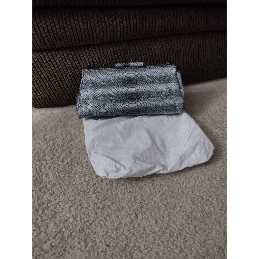 Perlina black, gray and white handbag